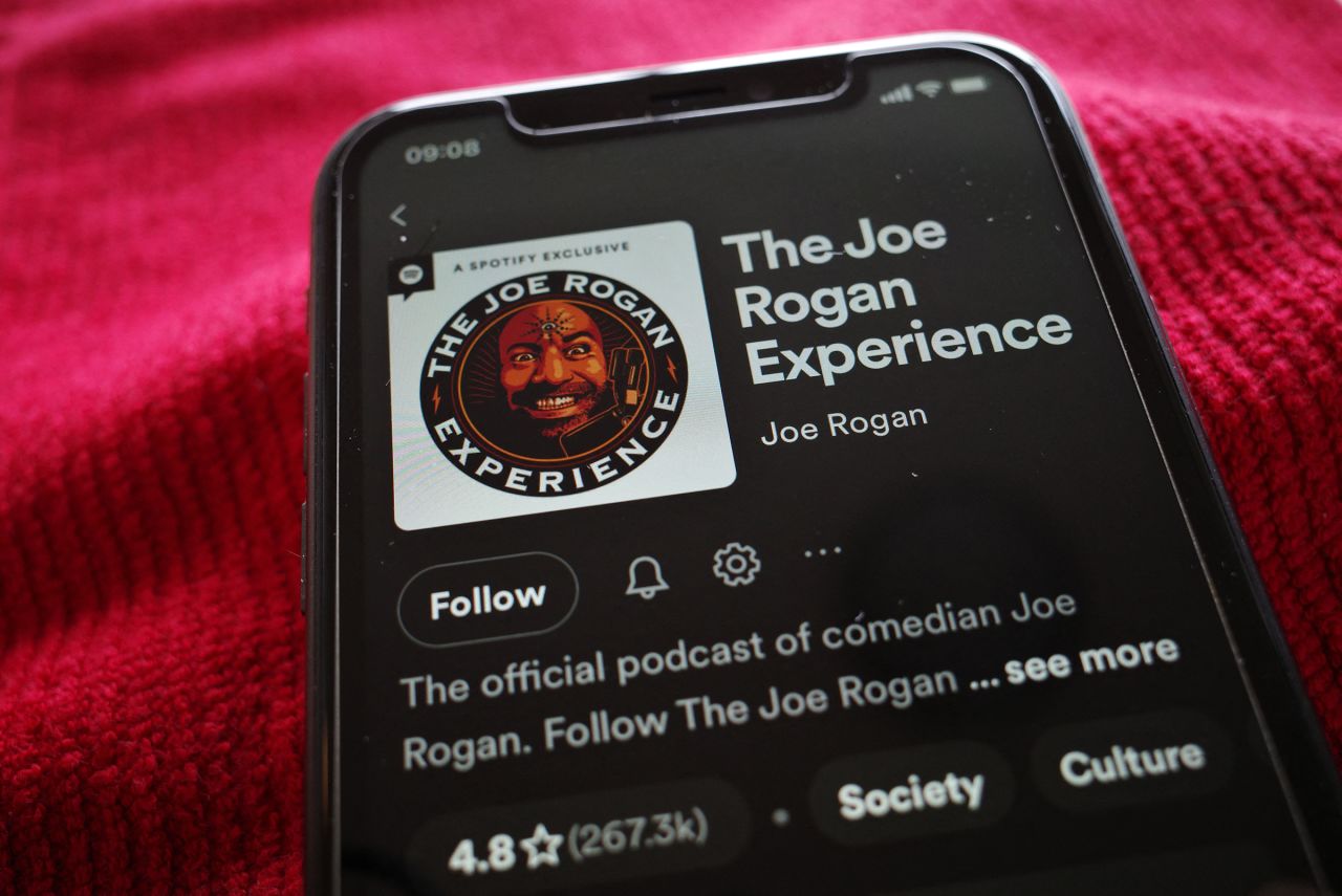 This illustration photo shows the Spotify page for "The Joe Rogan Experience" podcast displayed on a smart phone in Washington, DC on February 7, 2022.