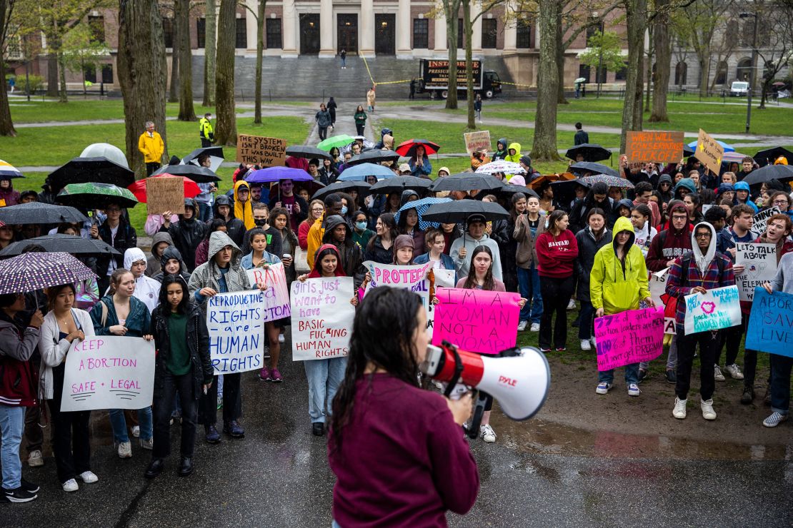 Ava Pallotta, center, speaks to students at Harvard University while they rallied on May 4, 2022 in Harvard Yard in Cambridge, Massachusetts, to defend abortion rights and protest against a leaked draft opinion of the US Supreme Court that would overturn Roe v. Wade, the landmark 1973 case that legalized abortion nationwide. They were met by counter-protests, who argued that Roe vs. Wade should be overturned. 