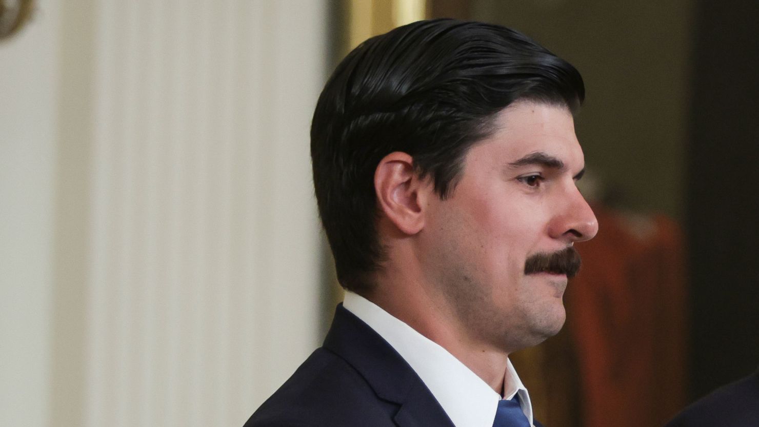Richard Trumka Jr. accepts the Presidential Medal of Freedom on behalf of his father the late Richard Trumka, president of the AFL-CIO, from U.S. President Joe Biden during a ceremony in the East Room of the White House July 7, 2022 in Washington, DC.