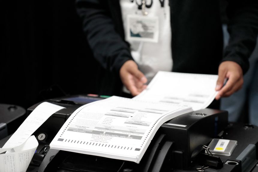 The City of Detroit Department of Elections performs a public accuracy test of its equipment, which is made by Dominion Voting Systems, on July 28, 2022.