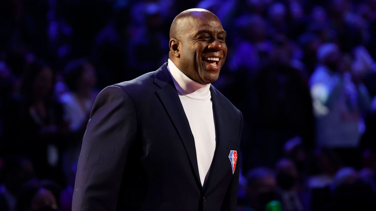 Magic Johnson reacts after being introduced as part of the NBA 75th Anniversary Team during the 2022 NBA All-Star Game at Rocket Mortgage Fieldhouse in February 2022 in Cleveland, Ohio. 