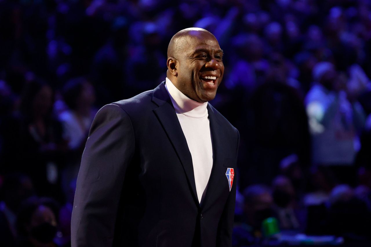 Magic Johnson reacts after being introduced as part of the NBA 75th Anniversary Team during the 2022 NBA All-Star Game at Rocket Mortgage Fieldhouse in February 2022 in Cleveland, Ohio. 