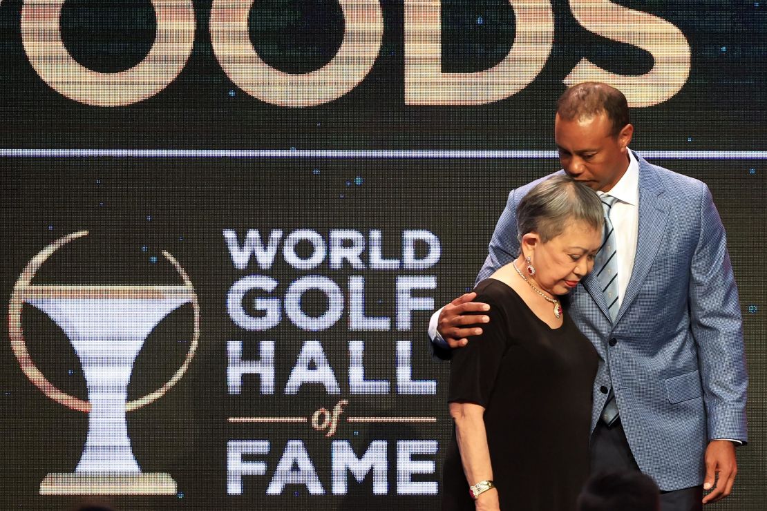 Tiger Woods and his mother Kultida Woods react as they pose for photos prior to his induction at the 2022 World Golf Hall of Fame Induction at the PGA TOUR Global Home on March 9, 2022 in Ponte Vedra Beach, Florida. 