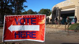 In this November 2022 photo, people wait in line for early voting for the midterm elections at Ponce De Leon Library in Atlanta.