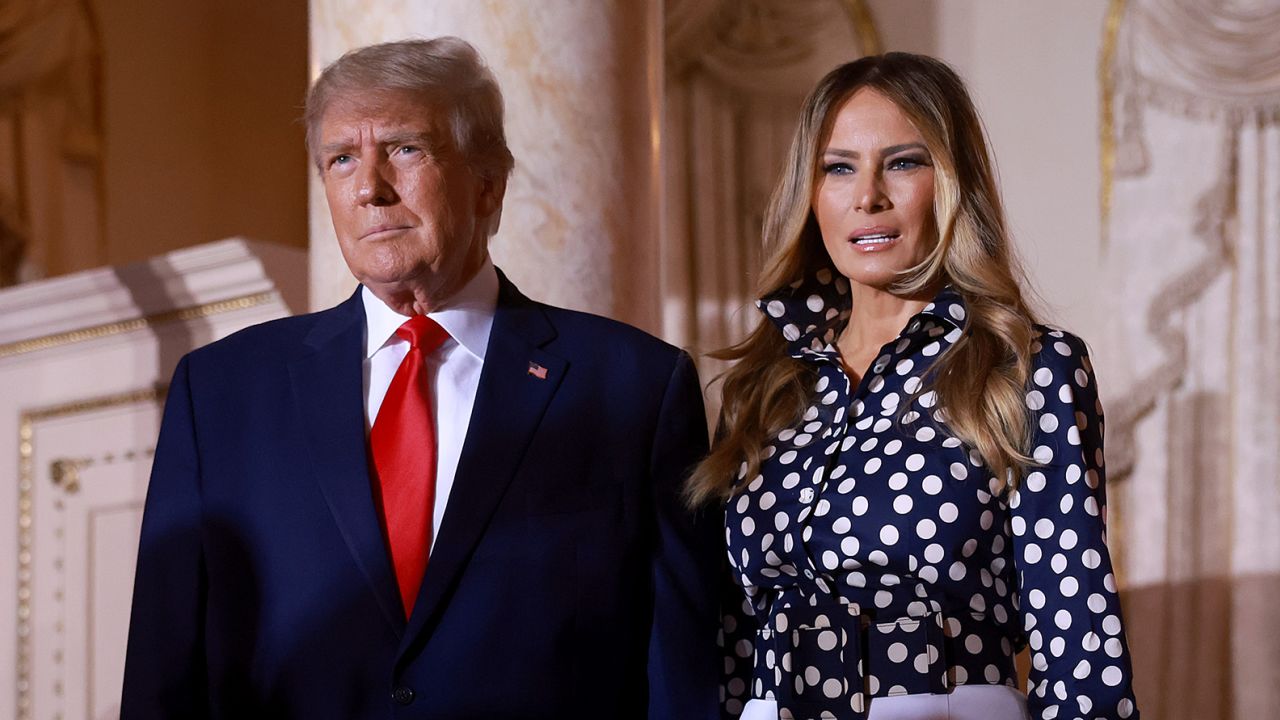 Former President Donald Trump and former first lady Melania Trump arrive for an event at his Mar-a-Lago home on November 15, 2022 in Palm Beach, Florida. 