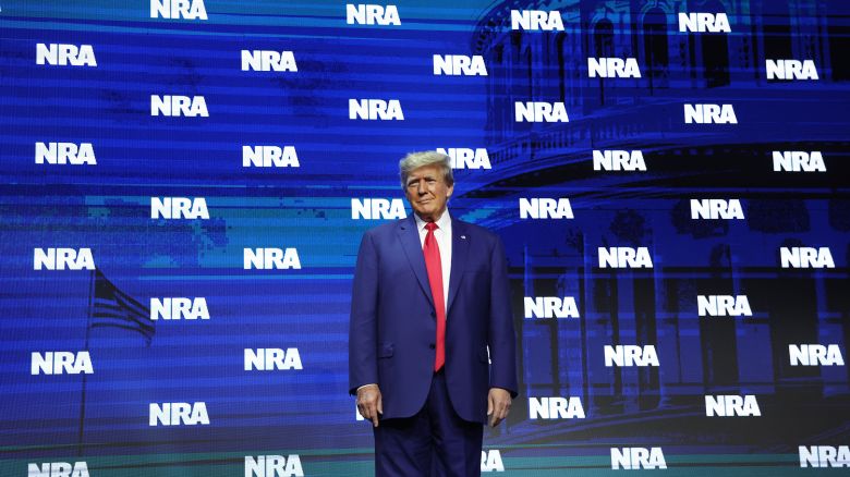 In this April 14, 2023 photo, former President Donald Trump arrives to speak to guests at the 2023 NRA-ILA Leadership Forum in Indianapolis. 
