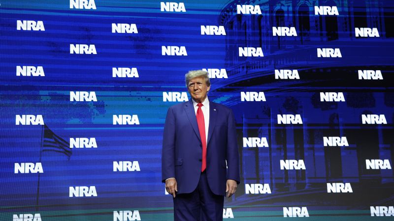 Trump addresses an embattled NRA as he campaigns against Biden’s gun policies