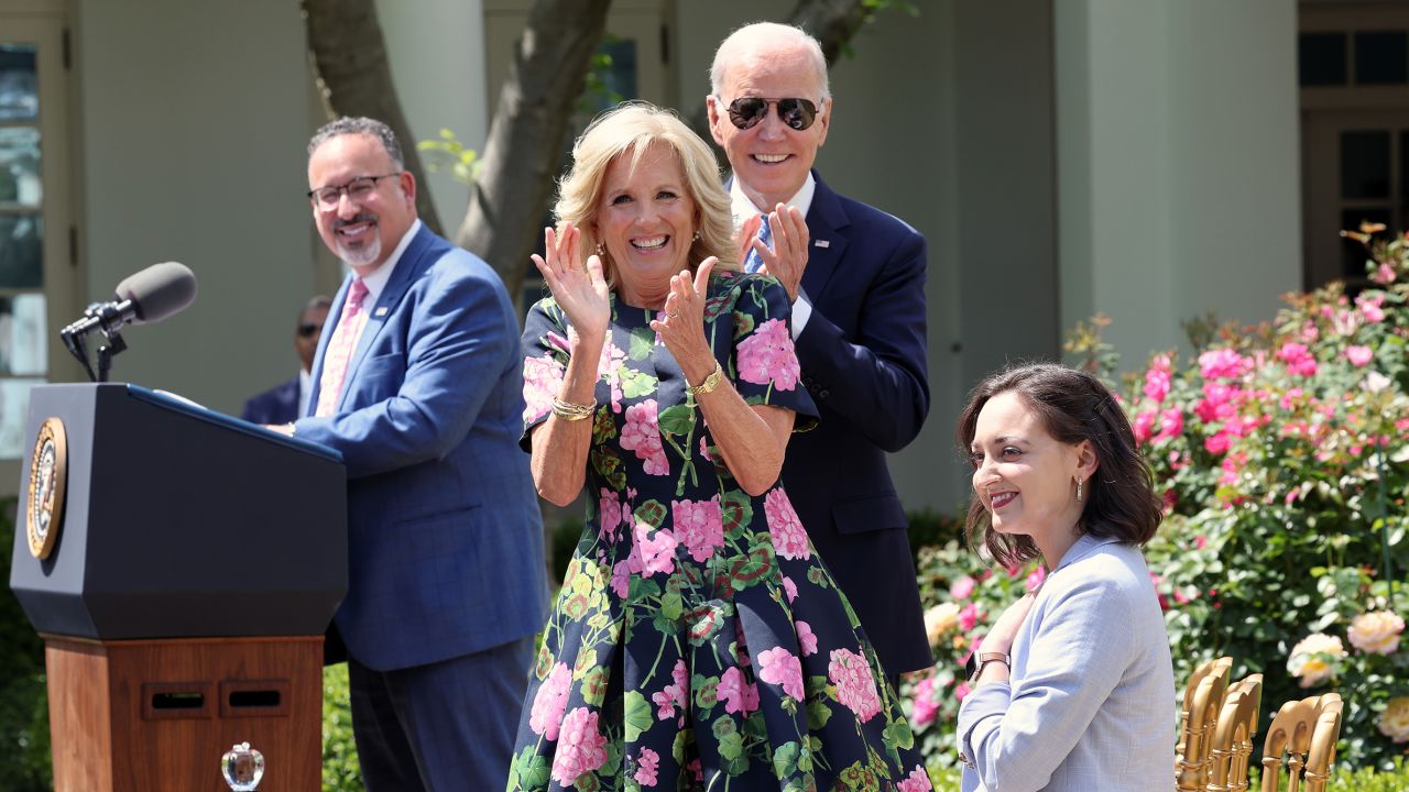 In this April 2023 photo, US Education Secretary Miguel Cardona, first lady Jill Biden and President Joe Biden applaud as Rebekah Peterson is named the 2023 National Teacher of the Year, in the Rose Garden at the White House in Washington, DC. 