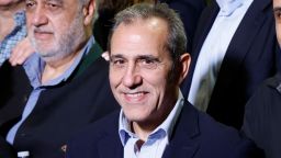 Emad Shargi smiles during a group photo after he and others who were released in a prisoner swap deal between US and Iran disembark from an airplane at Davison Army Airfield at Fort Belvoir, Virginia, on September 19, 2023.