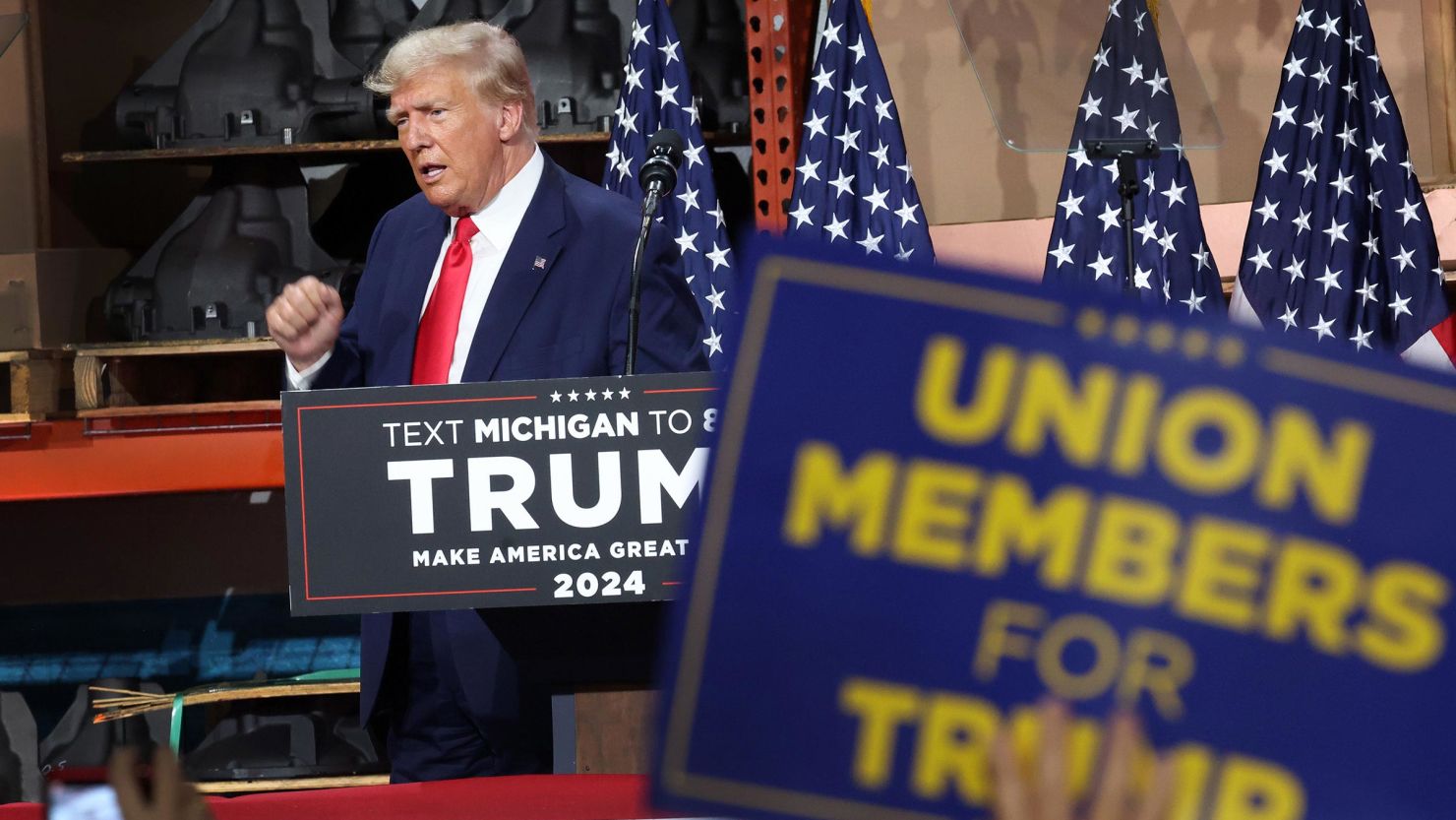 Donald Trump speaks at a campaign rally at Drake Enterprises, an automotive parts manufacturer, on September 27, 2023 in Clinton Township, Michigan.