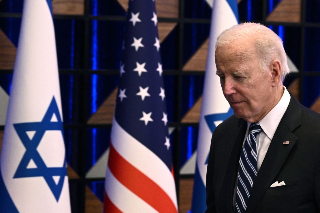 President Joe Biden leaves the room at the end of a press conference following a solidarity visit to Israel, on October 18, 2023, in Tel Aviv, amid the ongoing battles between Israel and the Palestinian group Hamas in the Gaza Strip. 