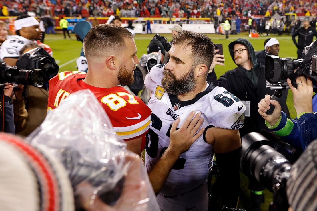 Jason Kelce talks to his brother Travis Kelce after their game at GEHA Field at Arrowhead Stadium on November 20, 2023 in Kansas City, Missouri. 