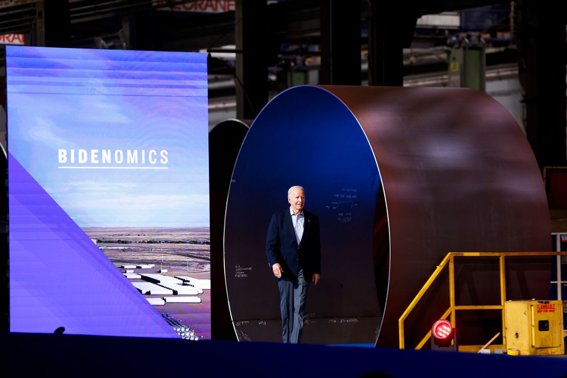 President Joe Biden walks onto the stage before speaking about Bidenomics at CS Wind on November 29, 2023 in Pueblo, Colorado. CS Wind, the largest wind turbine tower manufacturer in the world, announced they were expanding operations as a direct result of the Inflation Reduction Act.