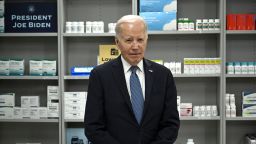 President Joe Biden listens as David Mitchell, not pictured, President and Founder, Patients for Affordable Drugs, speaks about lowering prescription drug costs at the National Institutes of Health in Bethesda, Maryland, on December 14, 2023. 