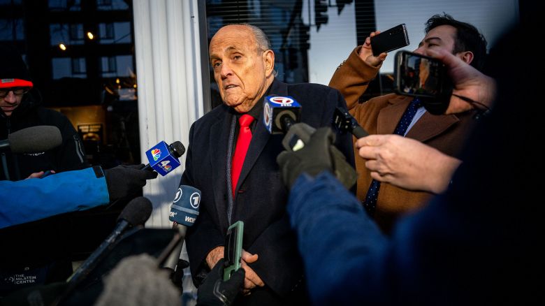 Rudy Giuliani speaks to members of the media where Republican candidate Florida Gov. Ron DeSantis was scheduled to host a campaign event on January 21 in Manchester, New Hampshire. 