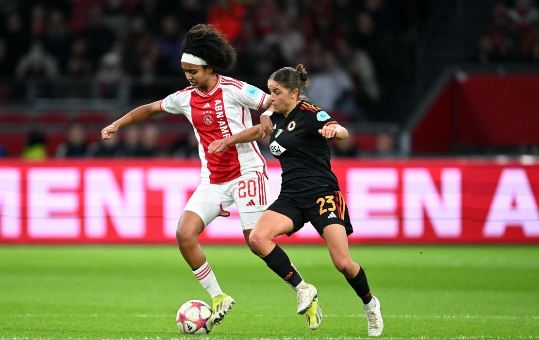 Lily Yohannes fights for the ball with Roma's Austrian midfielder #23 Laura Feiersinger during the UEFA Women's Champions League Group C football match between Ajax Amsterdam and AS Roma at the Johan Cruijff Arena in Amsterdam, on January 30.