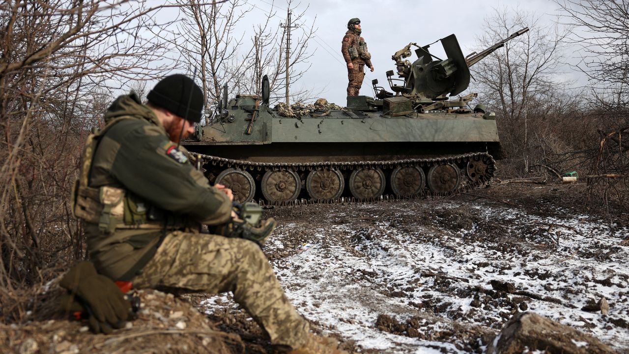 Ukrainian anti-aircraft gunners of the 93rd Separate Mechanized Brigade Kholodny Yar monitor the sky from their positions in the direction of Bakhmut in the Donetsk region, amid the Russian invasion of Ukraine, on February 20, 2024. 