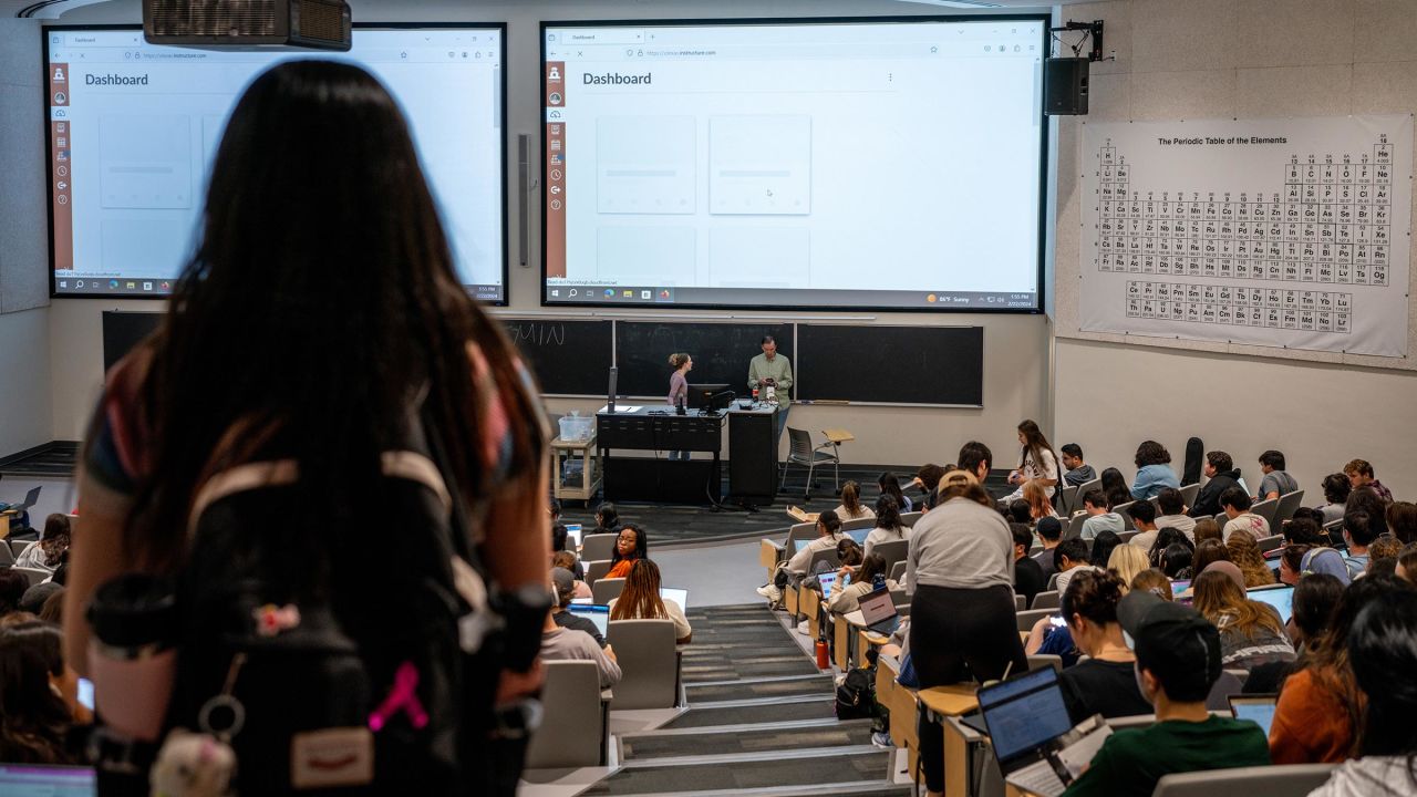 A student looks for a seat ahead of lecture at the University of Texas at Austin on February 22 in Austin, Texas. 