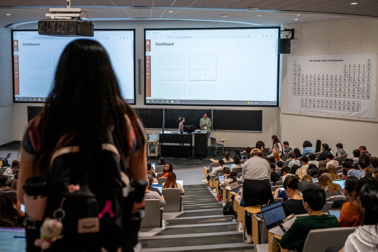 A student looks for a seat ahead of lecture at the University of Texas at Austin on February 22 in Austin, Texas. 