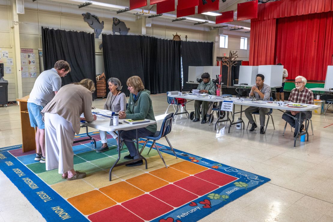 Voters check in to vote on Super Tuesday at the First Ward Creative Academy, Mecklenburg County Precinct 13 on March 5, in Charlotte, North Carolina. 
