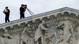 Members of the US Secret Service Counter-Sniper team set up watch from the roof of the House of Representatives on March 15, 2023 in Washington, DC. 