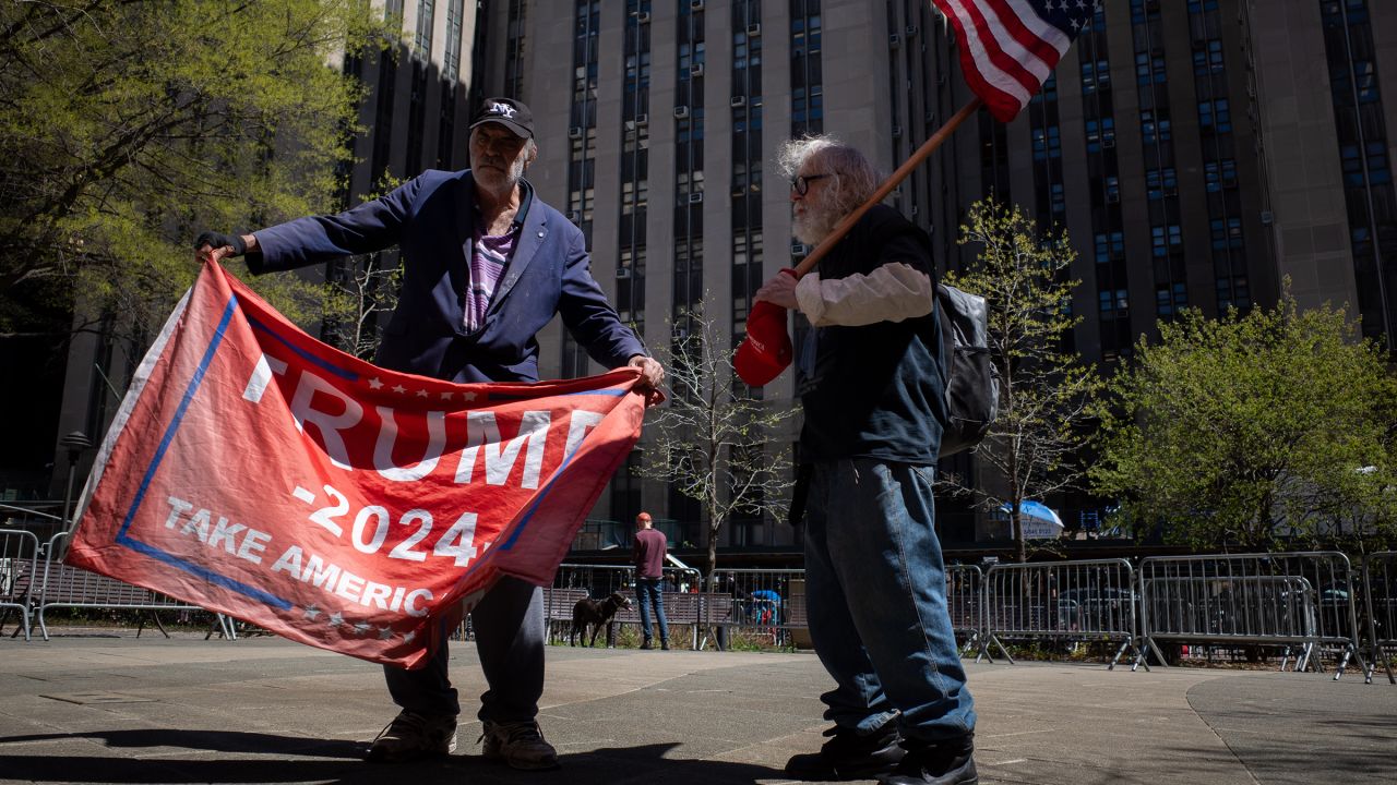 Trump supporters gather outside of Manhattan Criminal Court during Trump's hush money trial on April 16, 2024, in New York City.