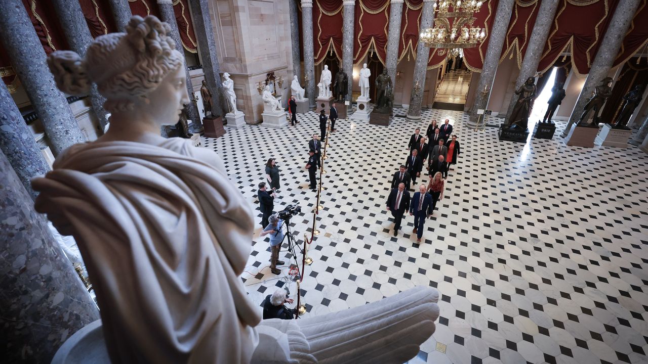 Republican impeachment managers from the House of Representatives proceed through Statuary Hall in the US Capitol while transferring articles of impeachment against Secretary of Homeland Security Alejandro Mayorkas April 16, in Washington, DC. 
