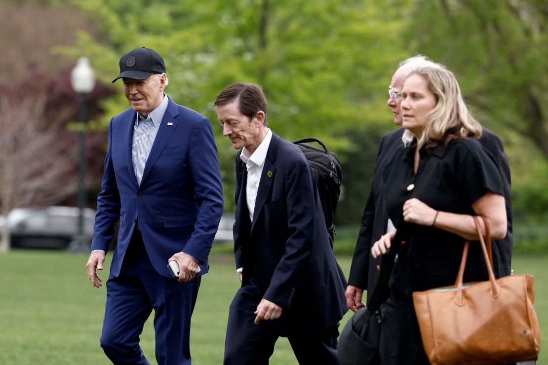 In this April 2024 photo, President Joe Biden walks to the White House with senior members of his staff after landing on the South Lawn in Marine One on April 17, 2024 in Washington, DC.