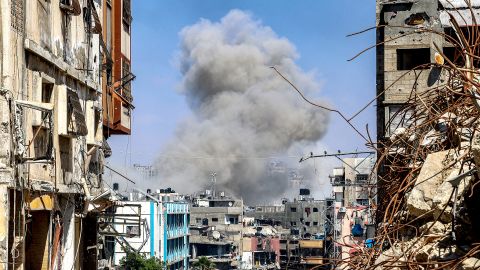 A smoke plume rises during Israeli bombardment in Jabalia in the northern Gaza Strip on May 14 amid the ongoing conflict in the Palestinian territory between Israel and Hamas.