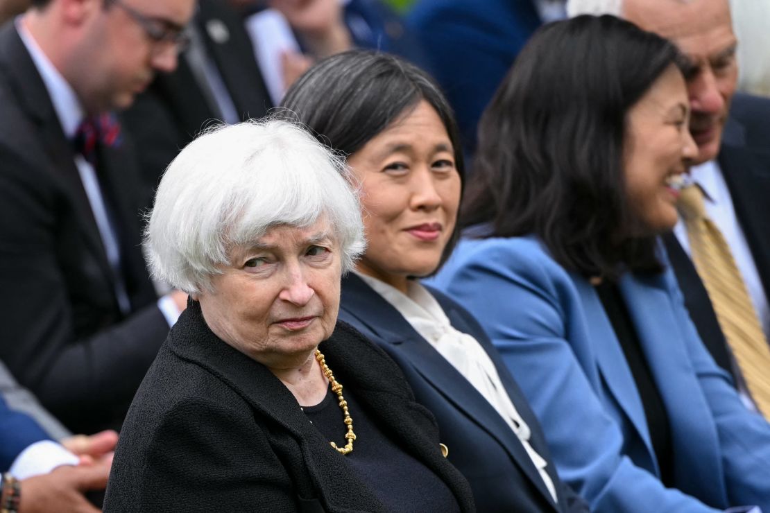 Treasury Secretary Janet Yellen and Trade Representative Katherine Tai await President Joe Biden's speech.