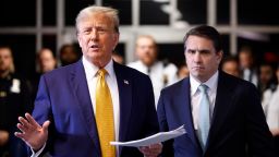 Former President Donald Trump speaks to members of the media alongside his lawyer Todd Blanche at his trial for allegedly covering up hush money payments at Manhattan Criminal Court on May 14. 