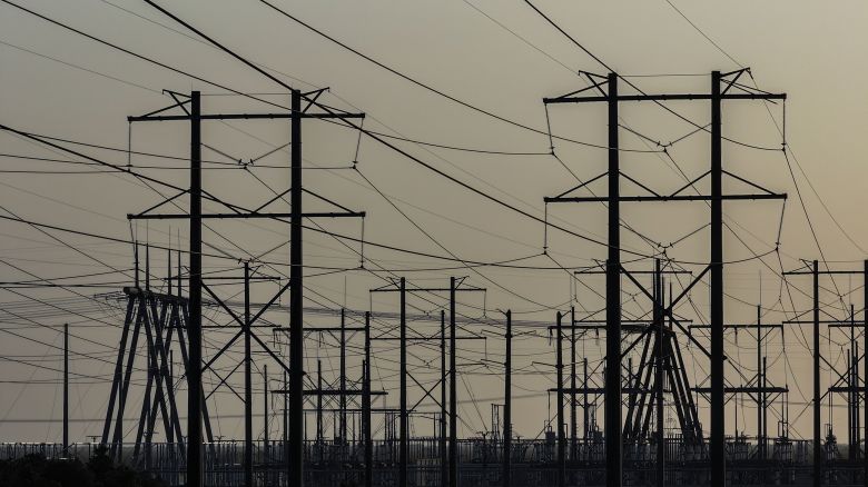 High voltage power lines run along the electrical power grid on May 16, in Pembroke Pines, Florida.