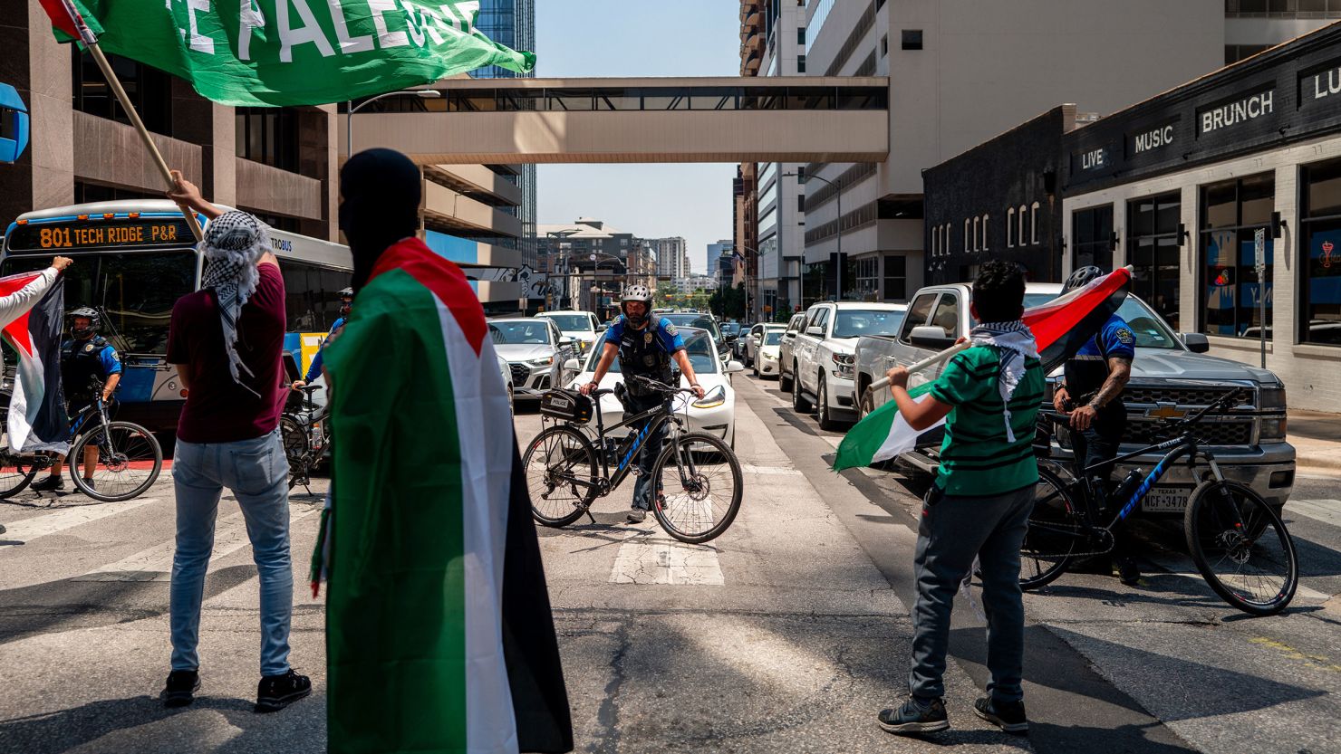 Law enforcement blocks an intersection as pro-Palestinian demonstrators protest the ongoing war with Israel in Gaza on the annual remembrance of Nakba near the Texas state Capitol on May 19 in Austin, Texas. 