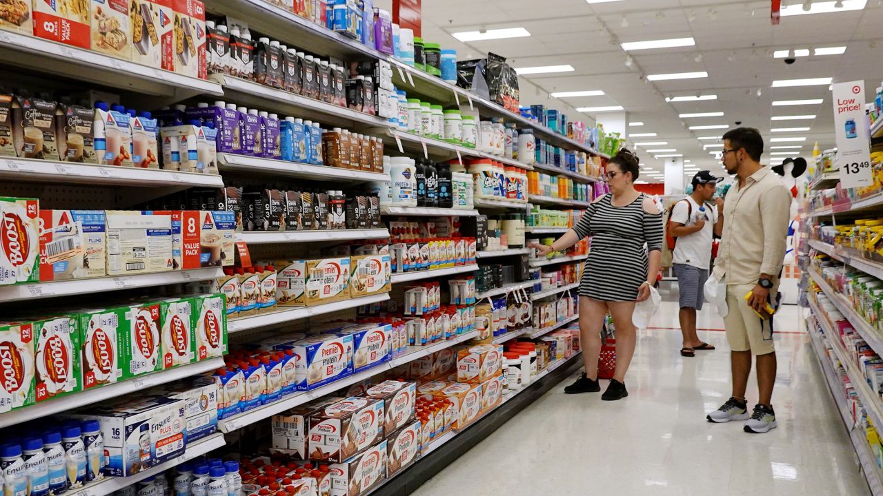 Customers shop at a Target store on May 20, 2024, in Miami, Florida. Target announced plans to cut prices on thousands of consumer basics as inflation cuts into household budgets.