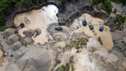 Aerial picture of dredges at an illegal gold mining area in the Madre de Dios department, in Peru's southeastern Amazon region, on May 31, 2024.