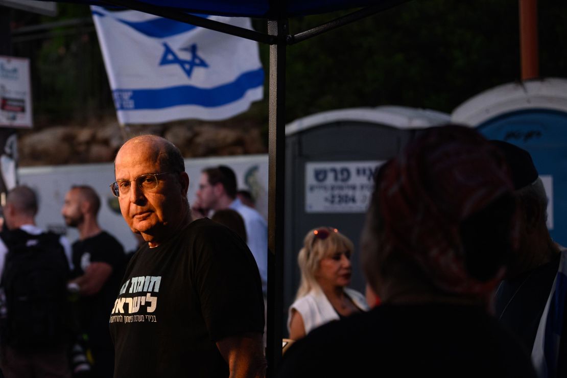 Former Israeli Minister of Defense and IDF Chief of Staff Moshe 'Bogie' Ya'alon waits to take the stage before speaking at a rally against the Netanyahu government outside the Knesset on June 18 in Jerusalem.