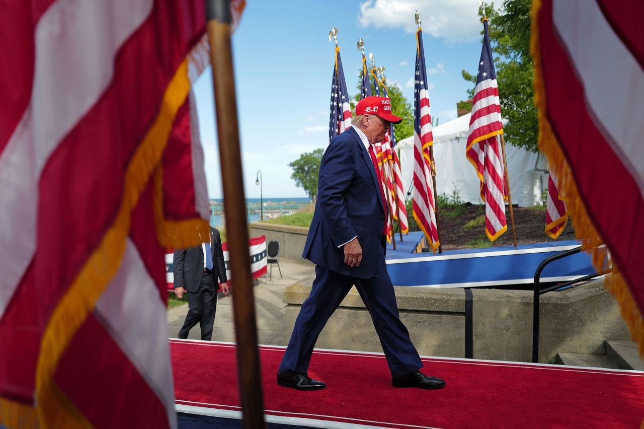 Former President Donald Trump leaves a rally at Festival Park on June 18 in Racine, Wisconsin. 