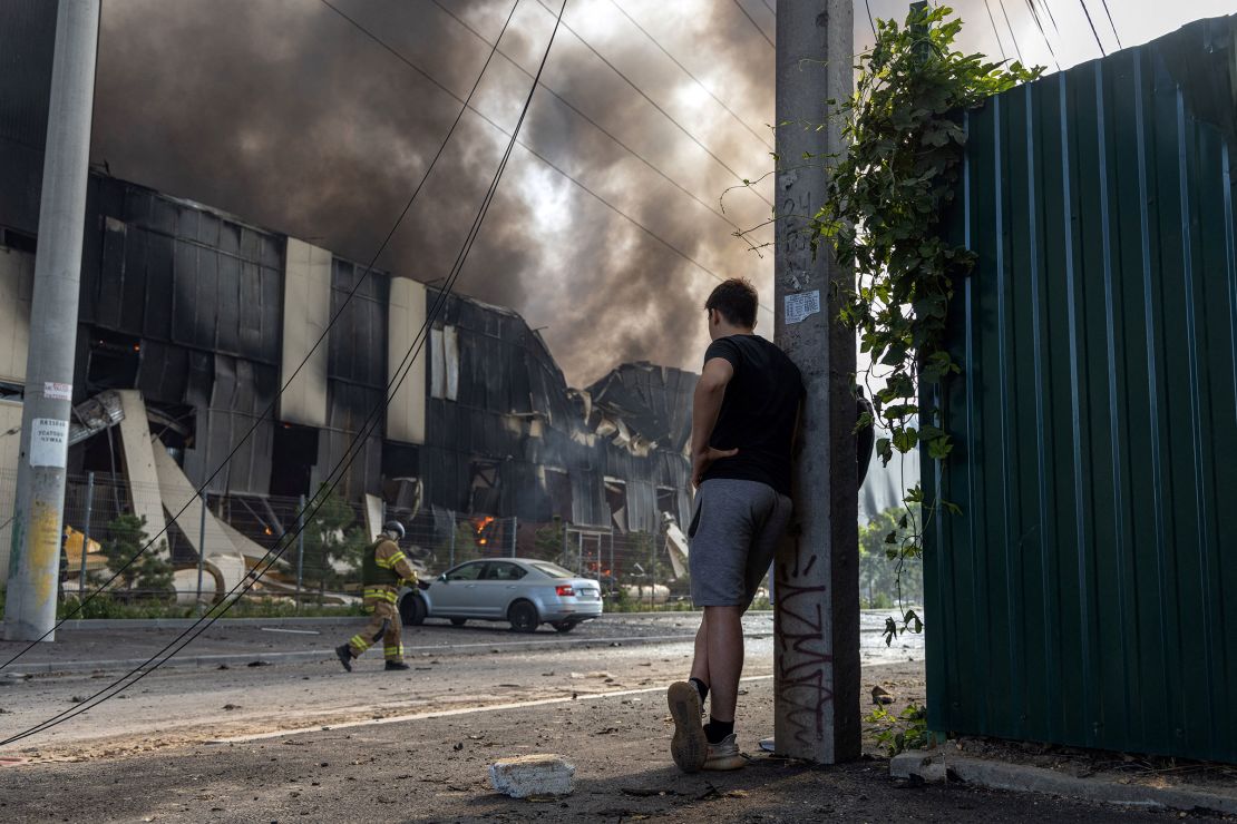 Firefighters work to extinguish a fire at the site of a Russian missile strike in Odesa, on June 24, 2024, amid the Russian invasion of Ukraine. 