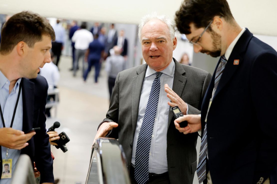 Sen. Tim Kaine speaks to reporters in the Senate Subway during a vote at the U.S. Capitol on June 20 in Washington, DC.