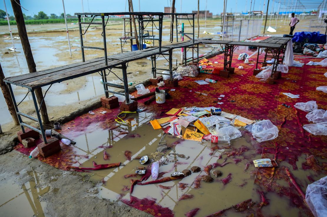 Personal belongings of victims who died in the crush are seen scattered at the venue in Uttar Pradesh.