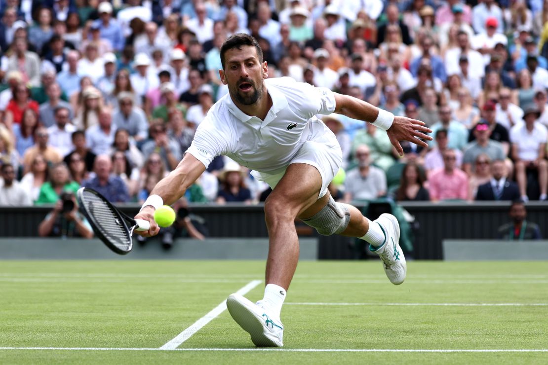 Novak Djokovic of Serbia plays a forehand against Jacob Fearnley of Great Britain in his Gentleman's Singles second round match during day four of The Championships Wimbledon 2024 at All England Lawn Tennis and Croquet Club on July 4, 2024 in London.