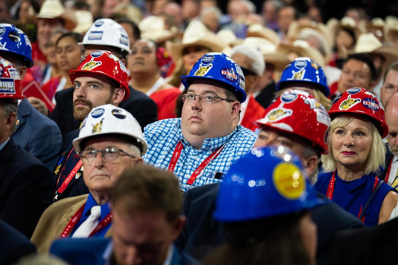 West Virginia delegates don hardhats in Fiserv Forum on the first day of Republican National Convention in Milwaukee, Wisconsin, on July 15.