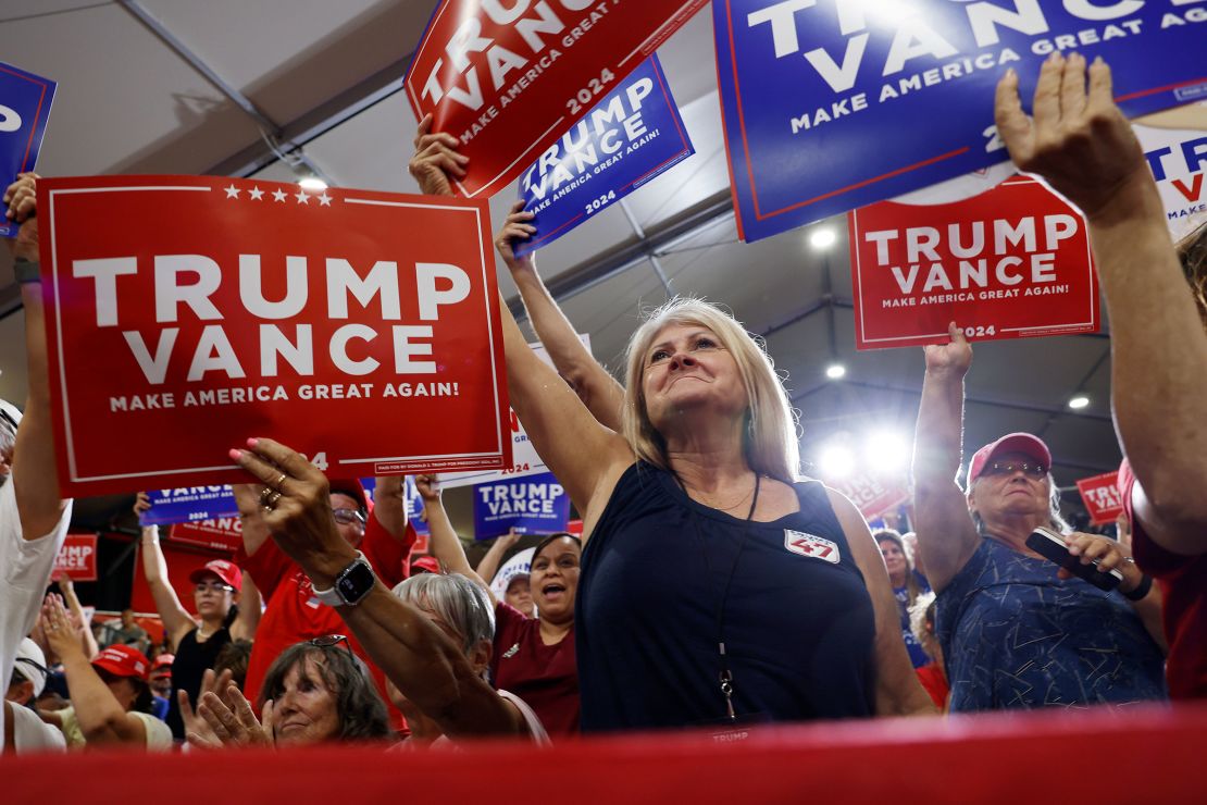 Supporters hold "Trump Vance" signs at Republican vice presidential nominee U.S. Sen. JD Vance (R-OH) campaign rally at Arizona Christian University on July 31, 2024 in Glendale, Arizona.