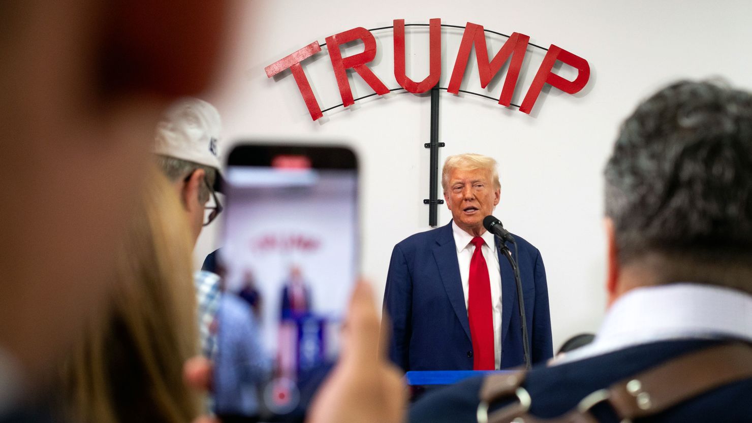 Former President Donald Trump speaks at Trump Force 47 campaign headquarters on August 26 in Roseville, Michigan. 