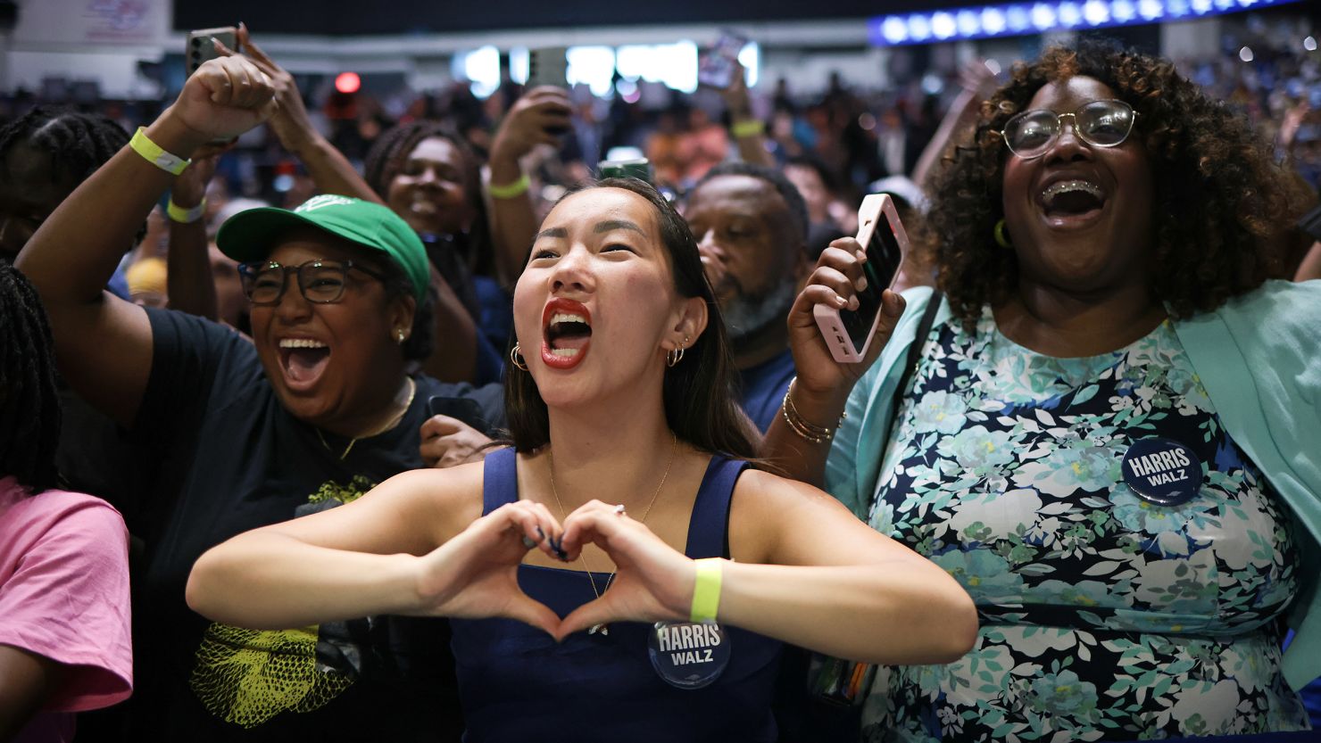 Supporters react as Vice President Kamala Harris speaks at a campaign rally at the Enmarket Arena August 29 in Savannah, Georgia.