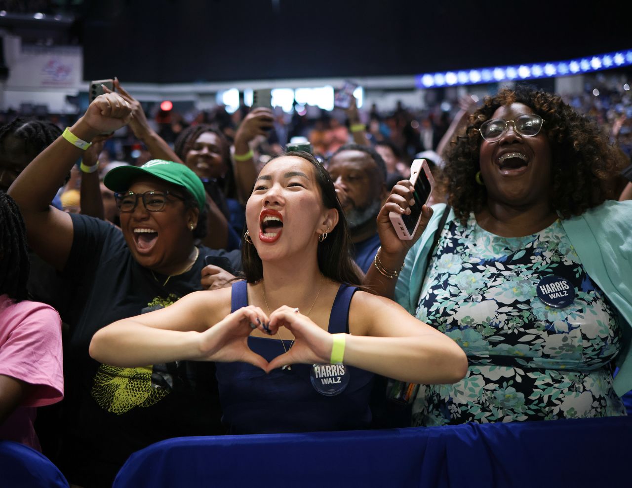 Supporters react as Vice President Kamala Harris speaks at a campaign rally at the Enmarket Arena August 29 in Savannah, Georgia.