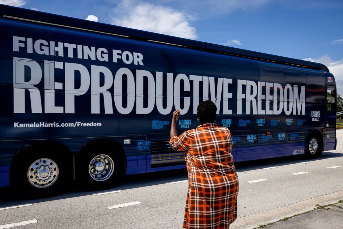 The Reproductive Freedom Bus leaves after the kickoff of the Harris-Walz campaign reproductive rights bus tour in Boynton Beach, Florida, on September 3. 