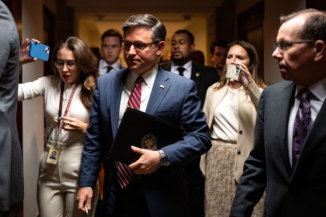 Speaker of the House Mike Johnson speaks with reporters as he leaves a press conference at the U.S. Capitol in Washington, DC on September 10.