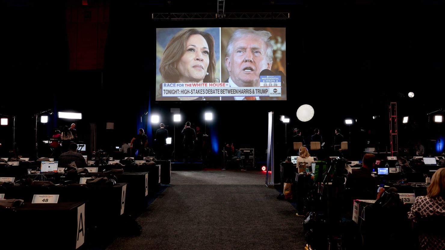 Vice President Kamala Harris and former President Donald Trump on a screen in the spin room ahead of the second presidential debate at the Pennsylvania Convention Center in Philadelphia on Tuesday, September 10. 