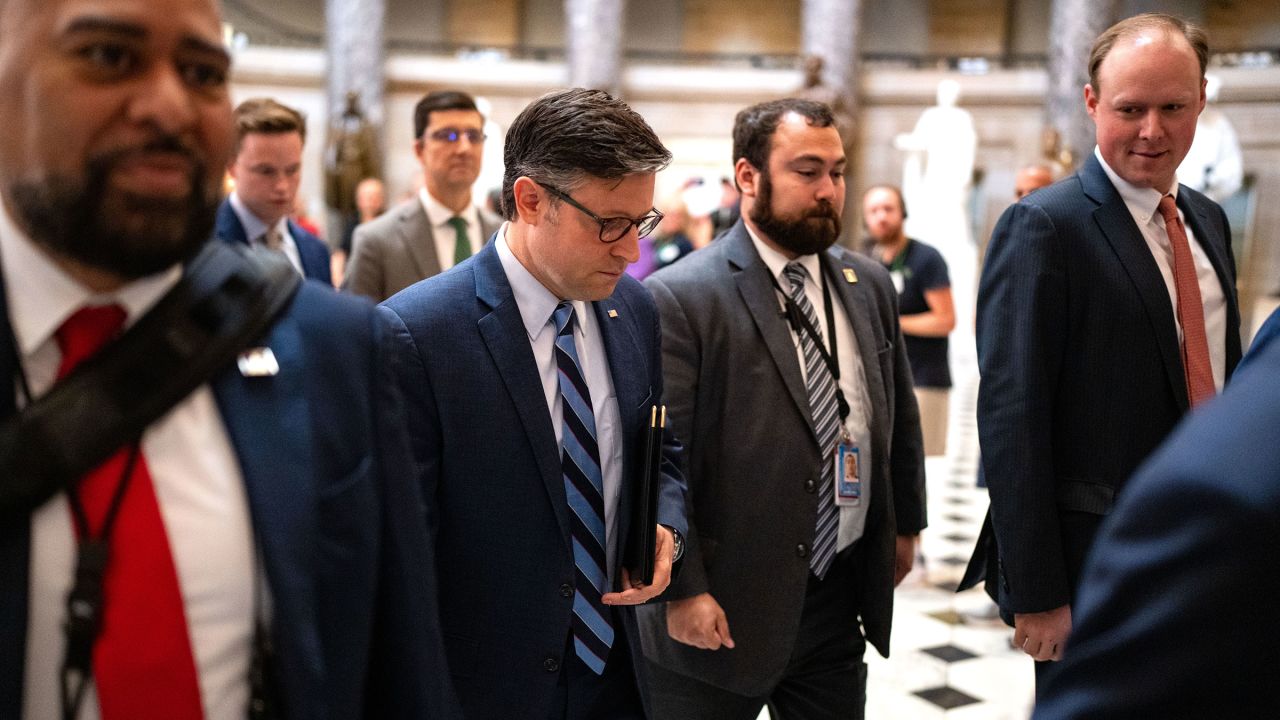 House Speaker Mike Johnson walks from his office to the house floor at the US Capitol on September 12 in Washington, DC.